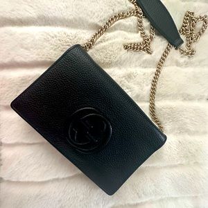 Black on Black authentic Gucci wallet with chain can be worn as crossover